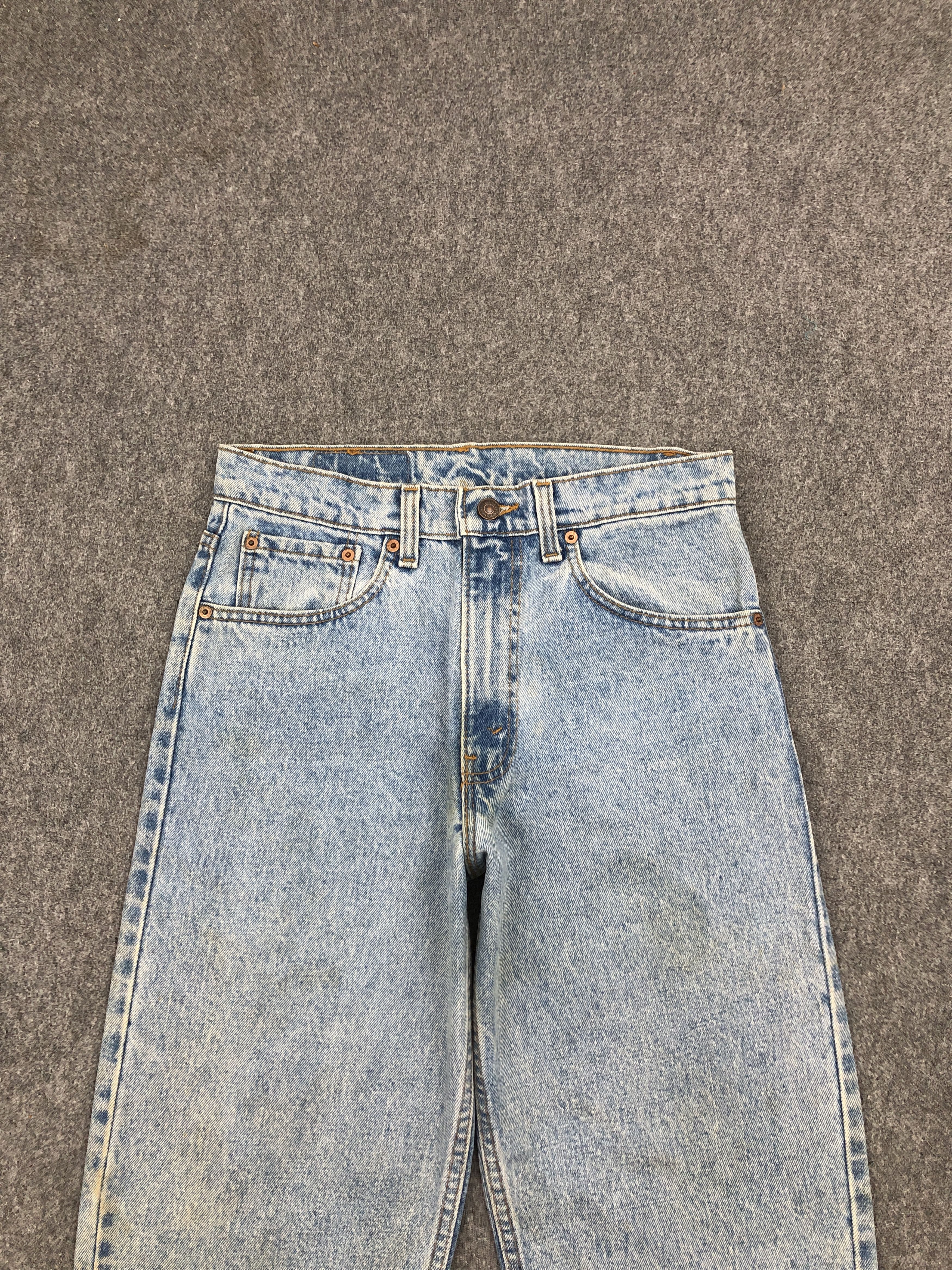 Distressed Vintage 90s Levi's 550 Light Washed Jeans