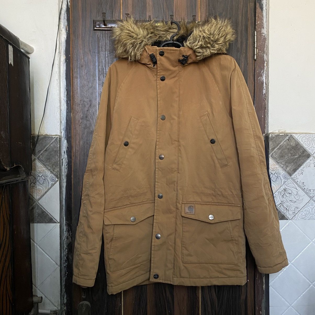 Carhartt WIP Trapper Parka in a Hamilton Brown color