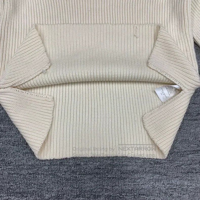The Row White wool knit sweater