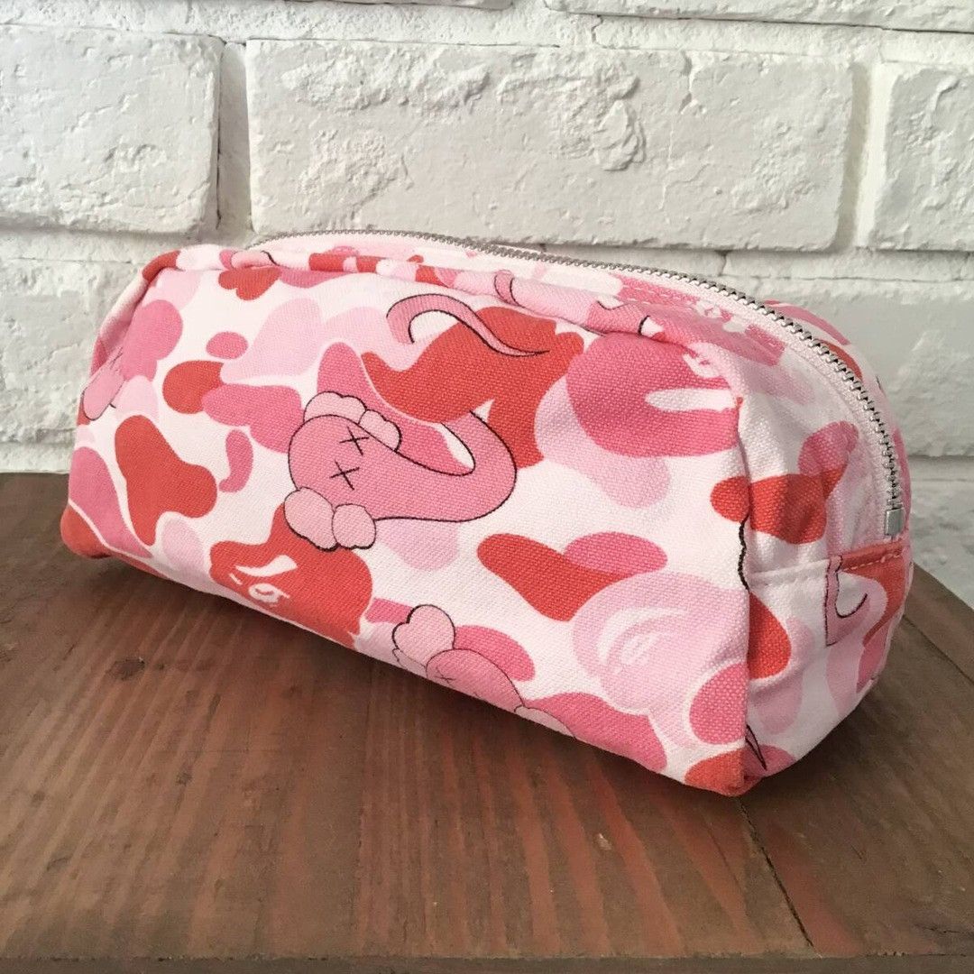 Bape × Kaws BAPE × KAWS Bendy ABC Camo Pink Pouch a bathing ape NIGO Size ONE SIZE - 1 Thumbnail