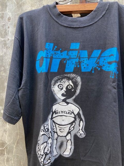 image of Band Tees x Vintage 1992 Drive Go Out Be Happy Vintage T-Shirt Out Freakage in Black (Size Medium)