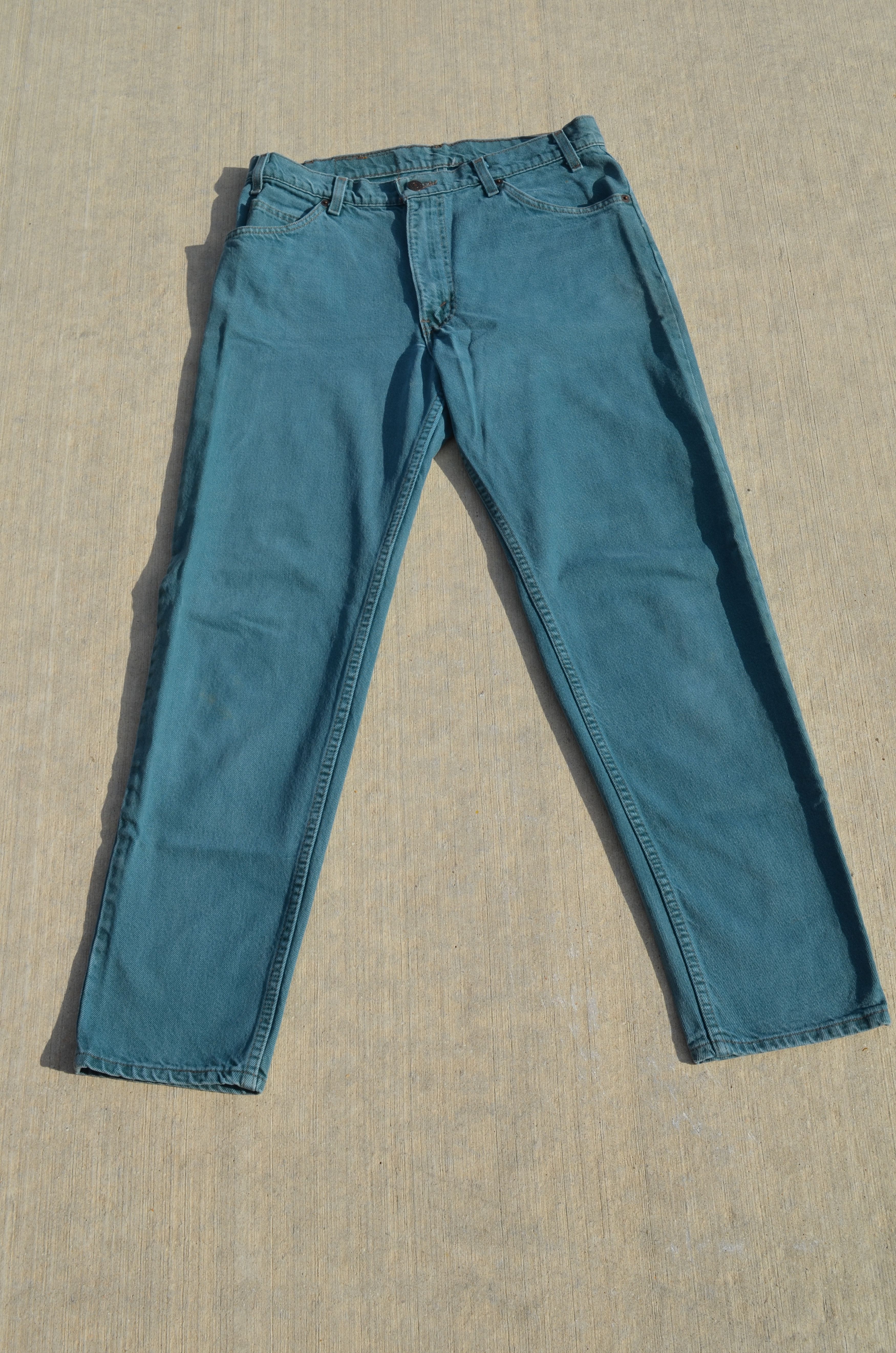 image of Levis Vintage Clothing Vintage Levi's 550 Emerald Green Denim Jeans in Emerald Sea Green (Size 33)