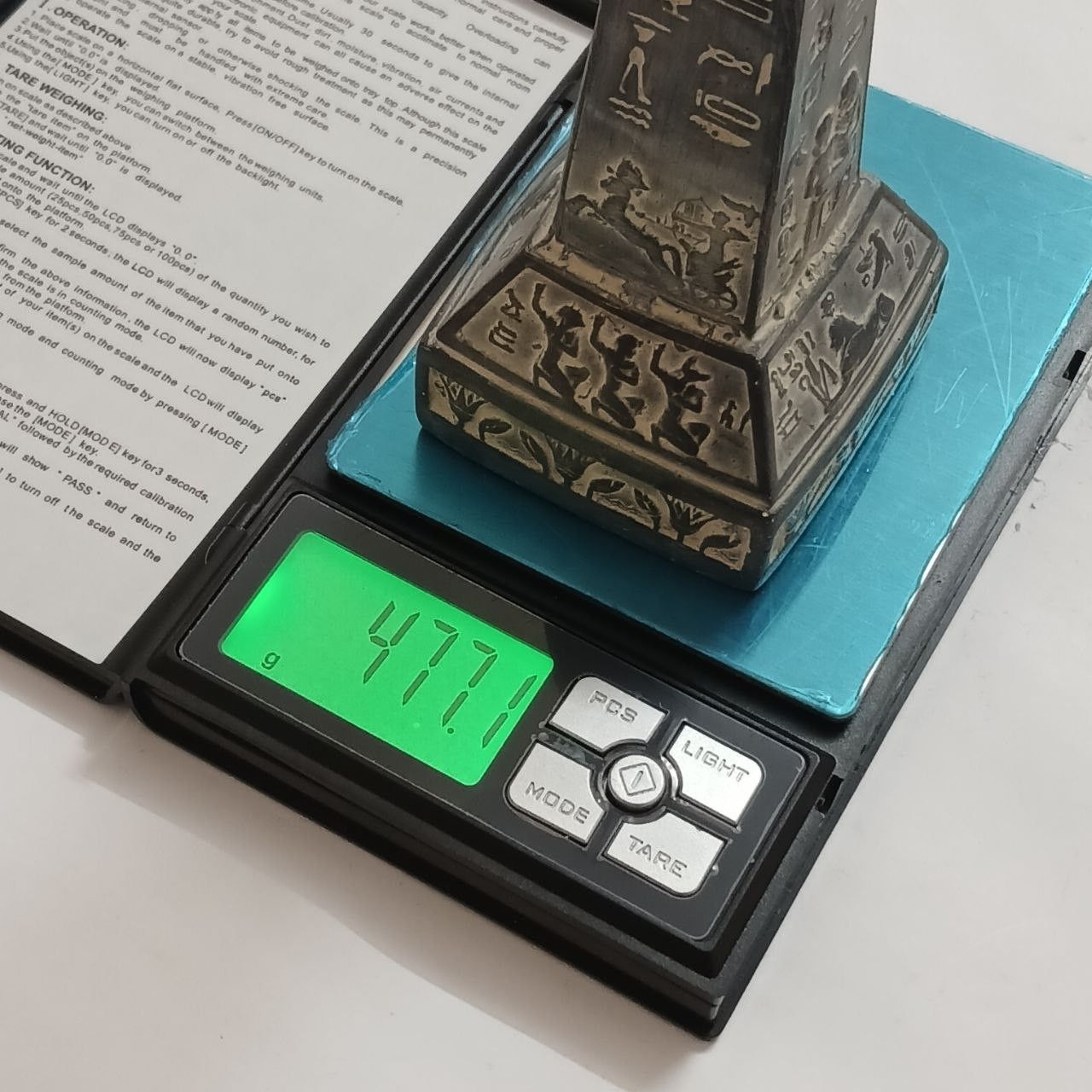 Pharaonic obelisk with hieroglyphs