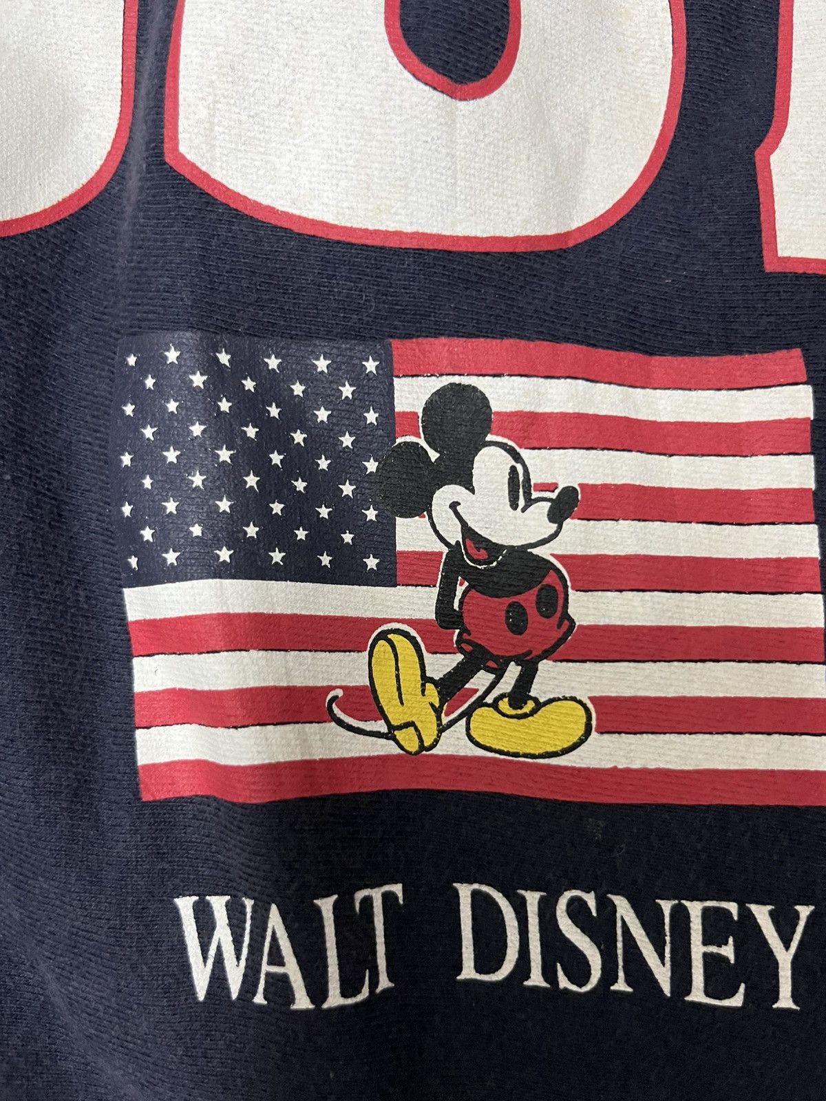 Mickey Mouse 💥Vintage Sunfaded Blue Black Walt Disney Mickey USA BIG LOGO Size US L / EU 52-54 / 3 - 13 Thumbnail
