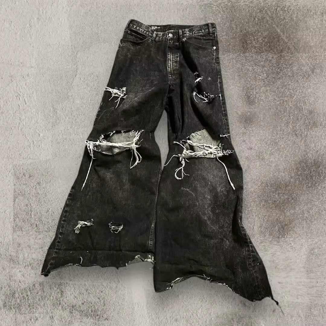ripped baggy slouchy jeans.