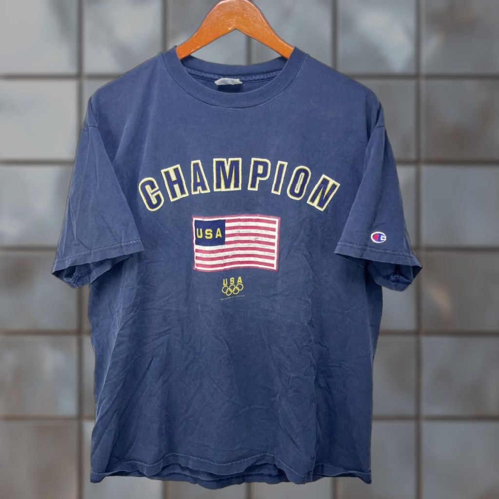 Champion VINTAGE Champion USA Olympics T Shirt XL Shirt Men 90s Blue/White Cotton Crew Neck Short Sleeve Vintage 90s Mens T-Shirt Size US XL / EU 56 / 4 - 1 Thumbnail