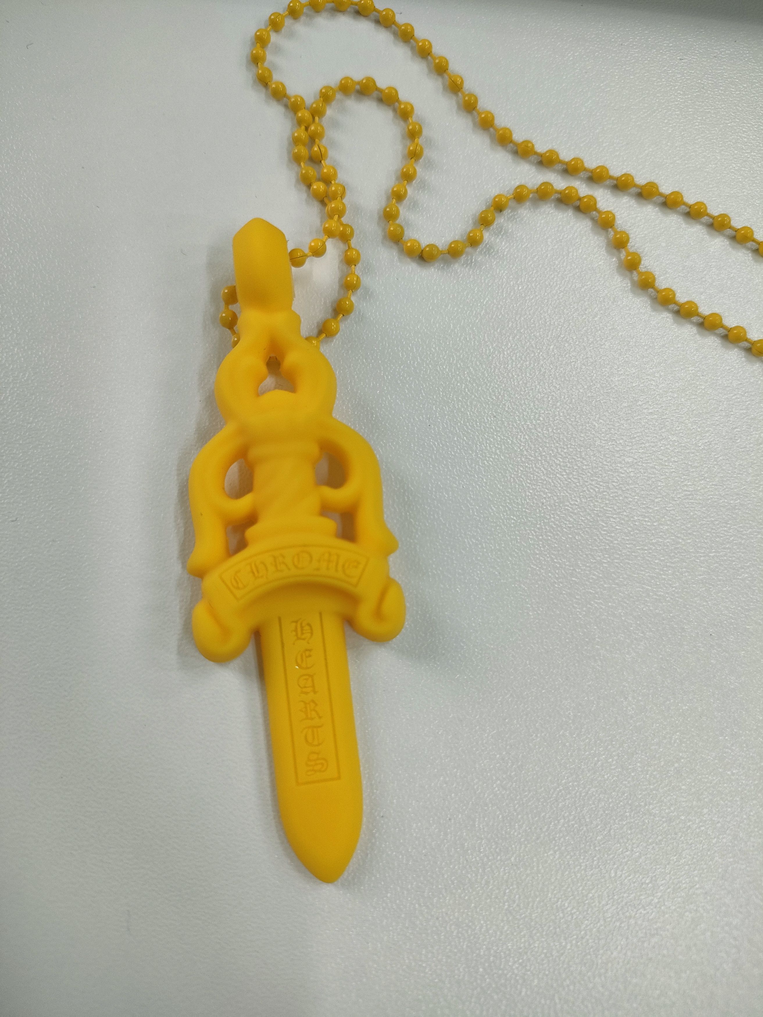 Chrome Hearts Resin Yellow Dagger Pendant Necklace