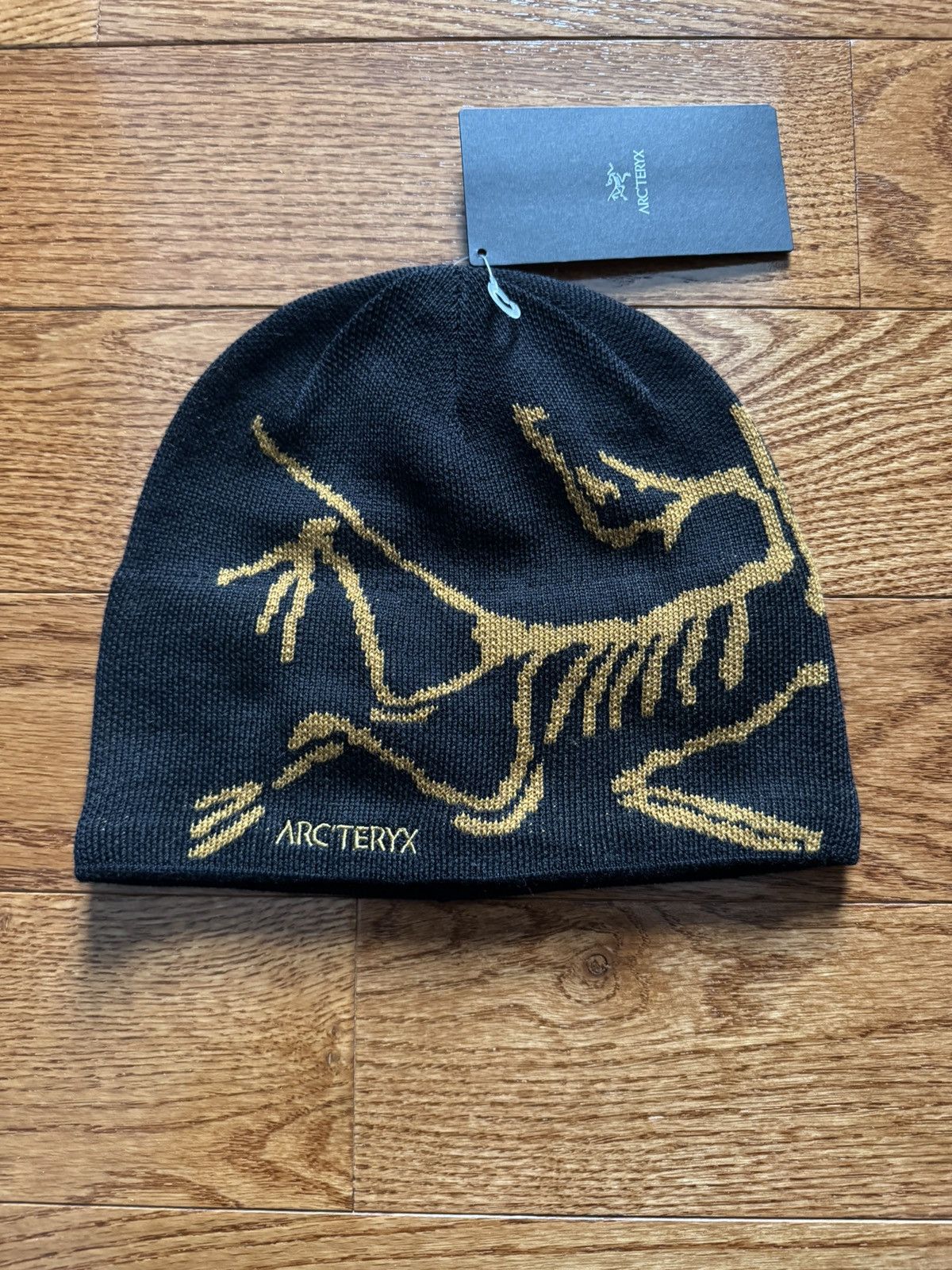 新品タグ付】Arc'teryx Fernie Toque Black Gold Bird Head Toque