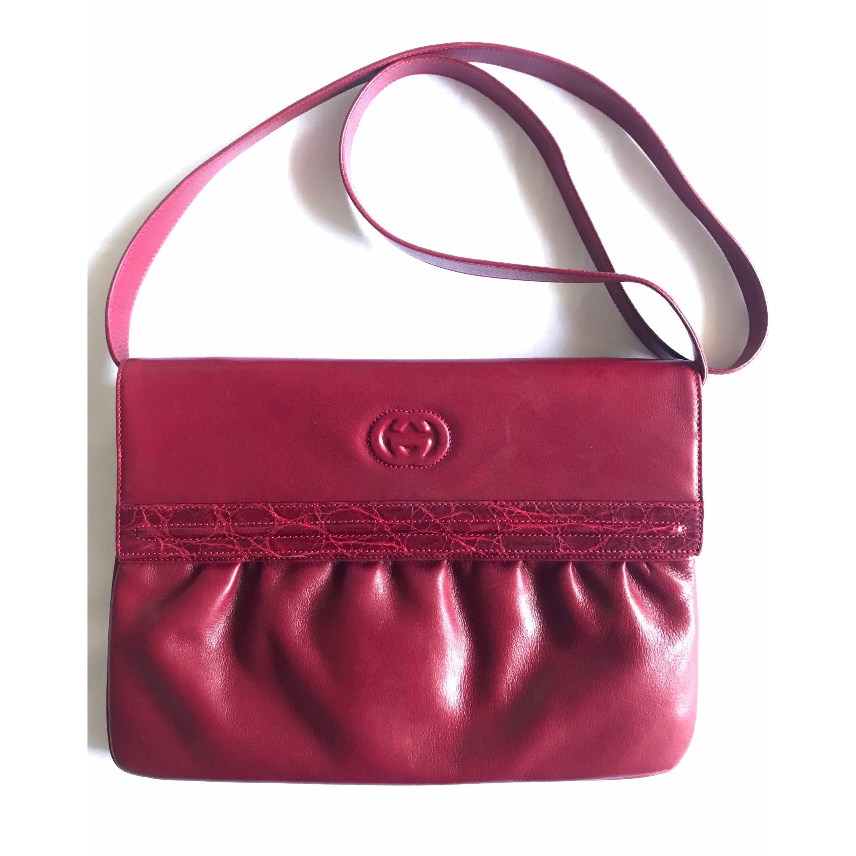 Vintage GUCCI wine red shoulder bag with GG engraved flap