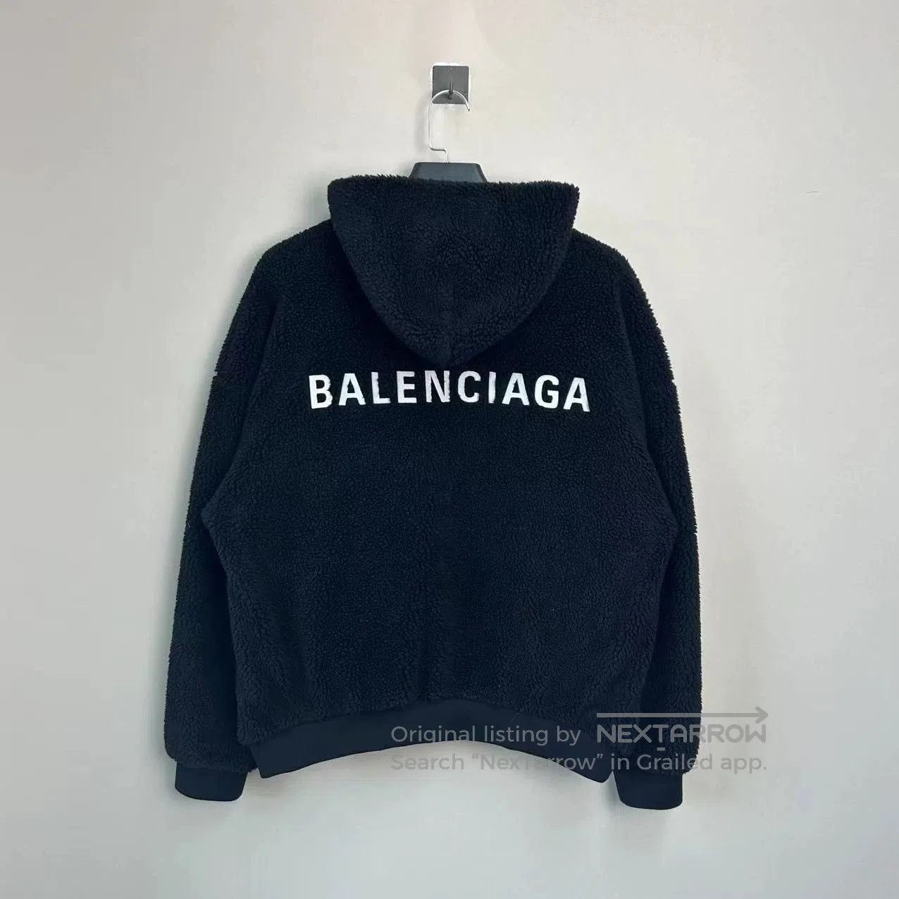 balenciaga teddy zip-up jacket in black.