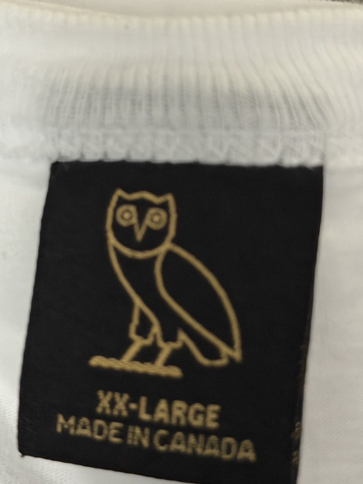 Drake 🦖🦉OVO X NBA X JURASSIC PARK WHITE OG OWL T-SHIRT TEE Size US XXL / EU 58 / 5 - 7 Thumbnail