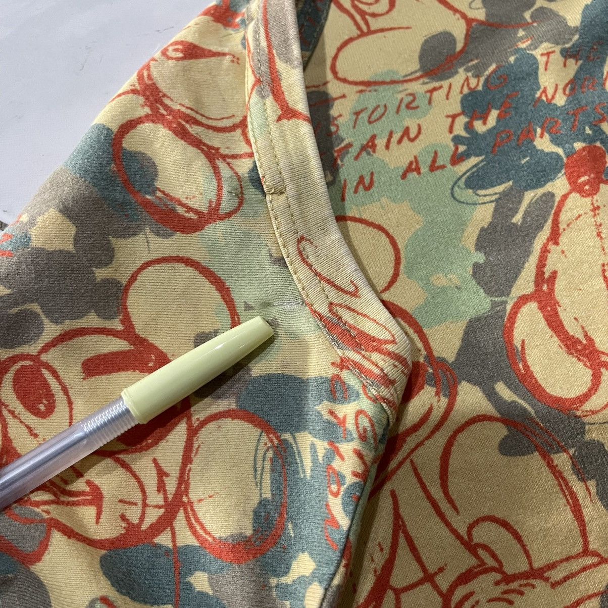 Comme des garcons disney all over print tee