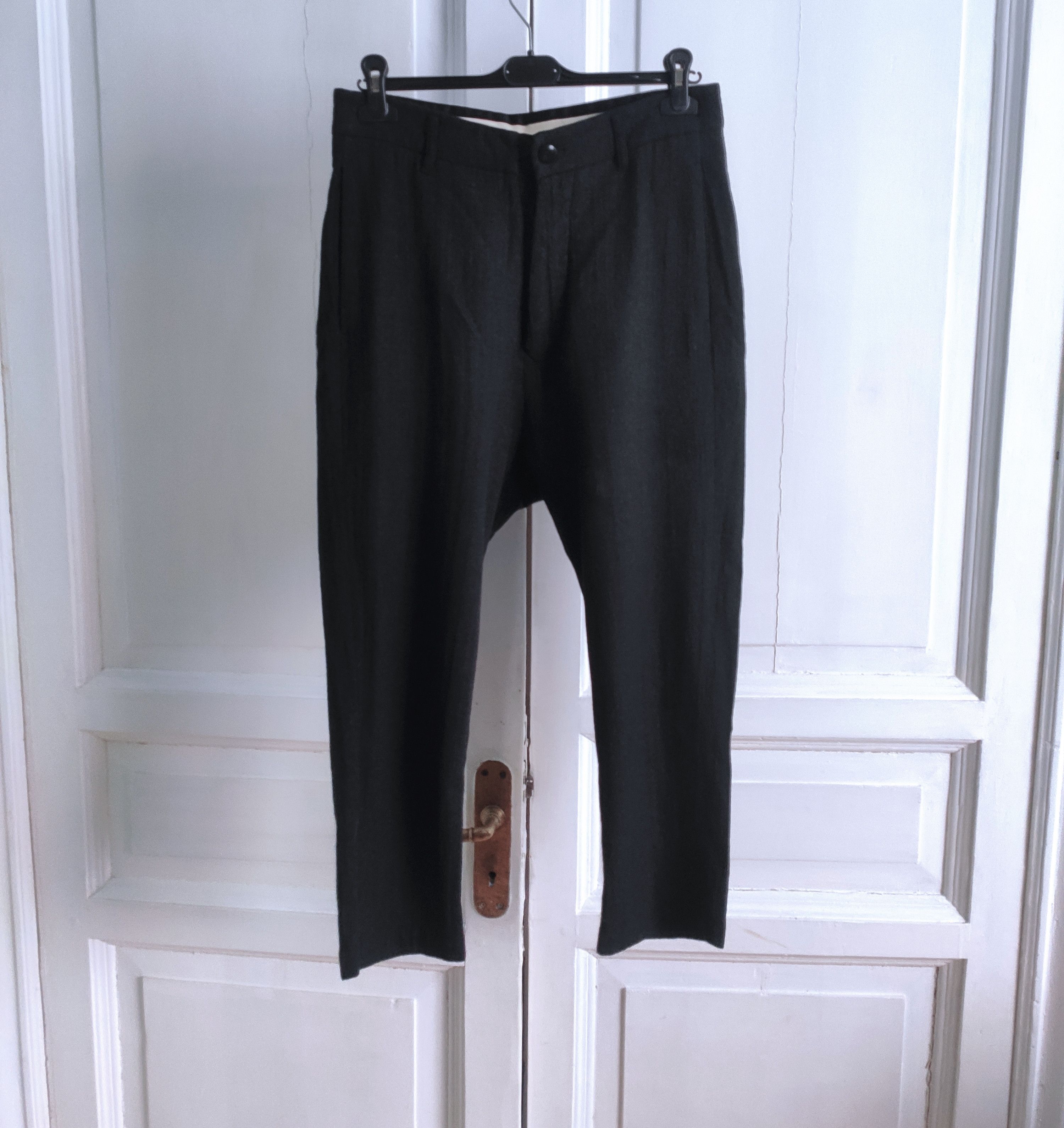 Wool drop crotch trousers.Like Layer-0 or Deepti