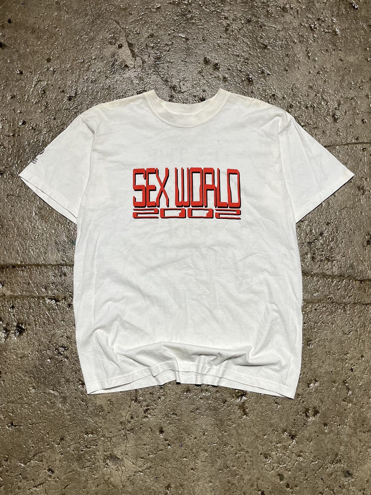 image of Crazy Vintage Sex World 2002 Pornstar Nude Humor Tee Shirt in White, Men's (Size Large)