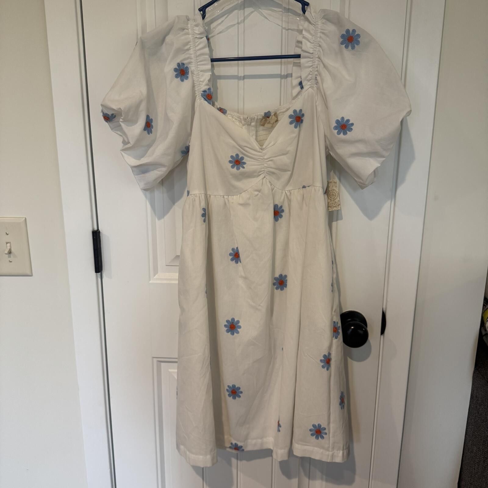 brandy melville blue and white floral dress Light blue Brandy Melville floral dress