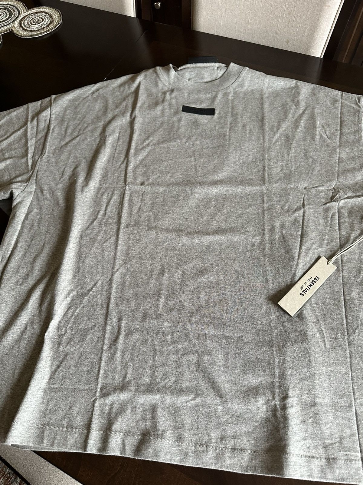 Essentials × Fear of God Fear of God Essentials Dark Heather Oatmeal T-Shirt -Size XL Size US XL / EU 56 / 4 - 6 Thumbnail
