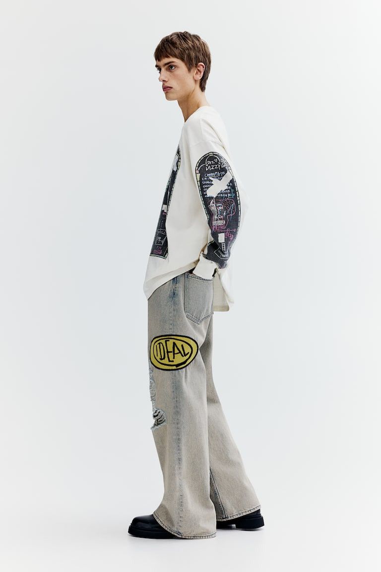 H&M × Jean-Michel Basquiat × Who Decides War Who Decides War bootcut loose jeans H&M x Basquiat x Ev&Tela Size US 31 - 6 Thumbnail
