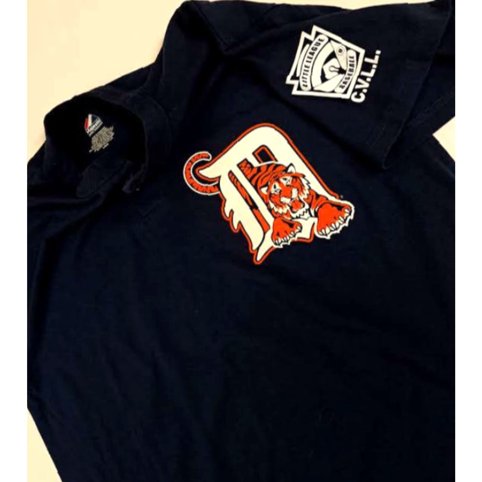Vintage Majestic T-Shirt Detroit Tigers Little League C.V.L.L. 1/4 Button Jersey #38 LG Blue Jersey 29in lg 23in pit to pit Boys? No, Men L Size US L / EU 52-54 / 3 - 4 Thumbnail