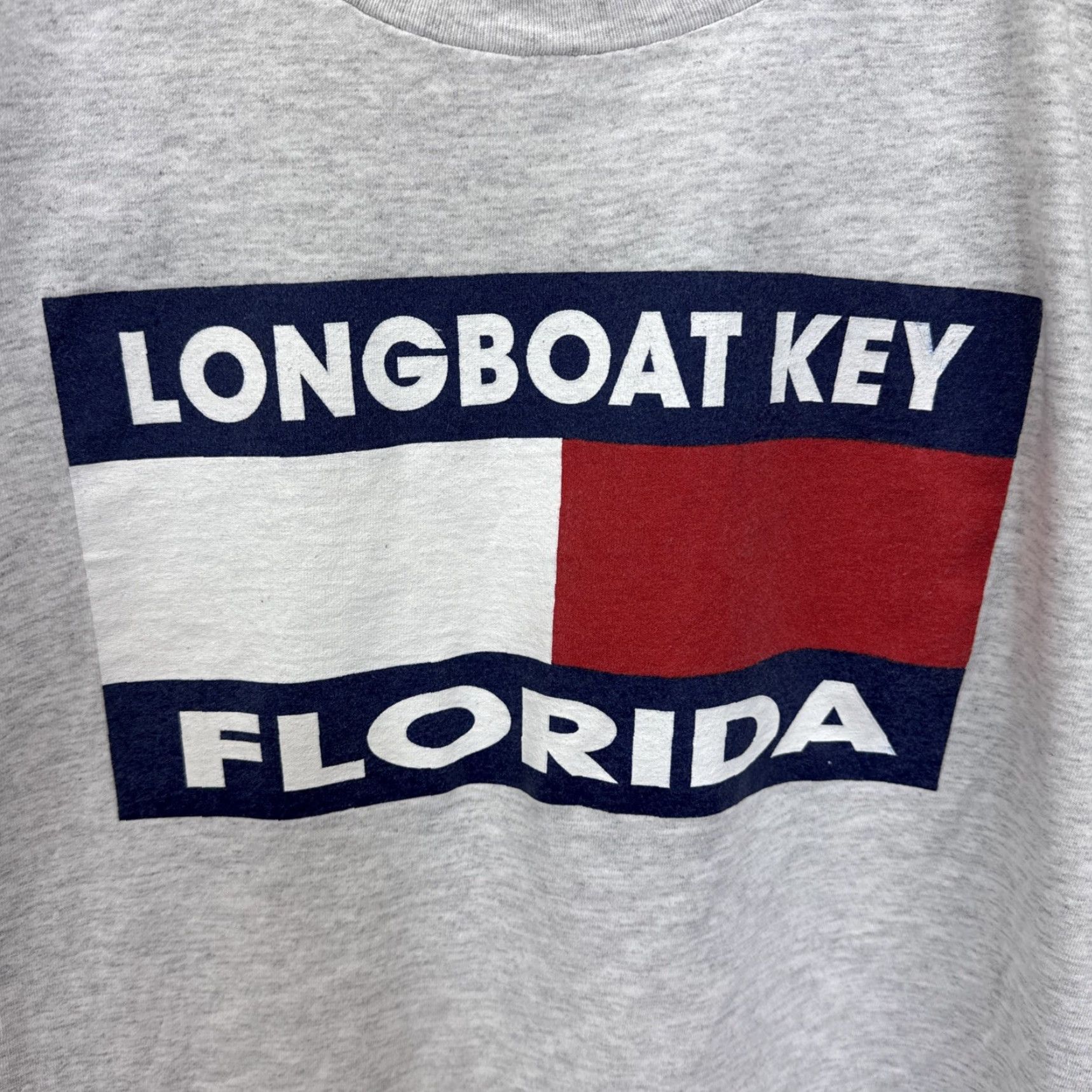 Tommy Hilfiger Vintage Murina LONGBOAT KEY FLORIDA T-SHIRT Gray Unisex Adults L Crew Neck Short Sleeve 90s USA Flag Graphic Floral Pattern? Wait no dais. Size US L / EU 52-54 / 3 - 2 Thumbnail