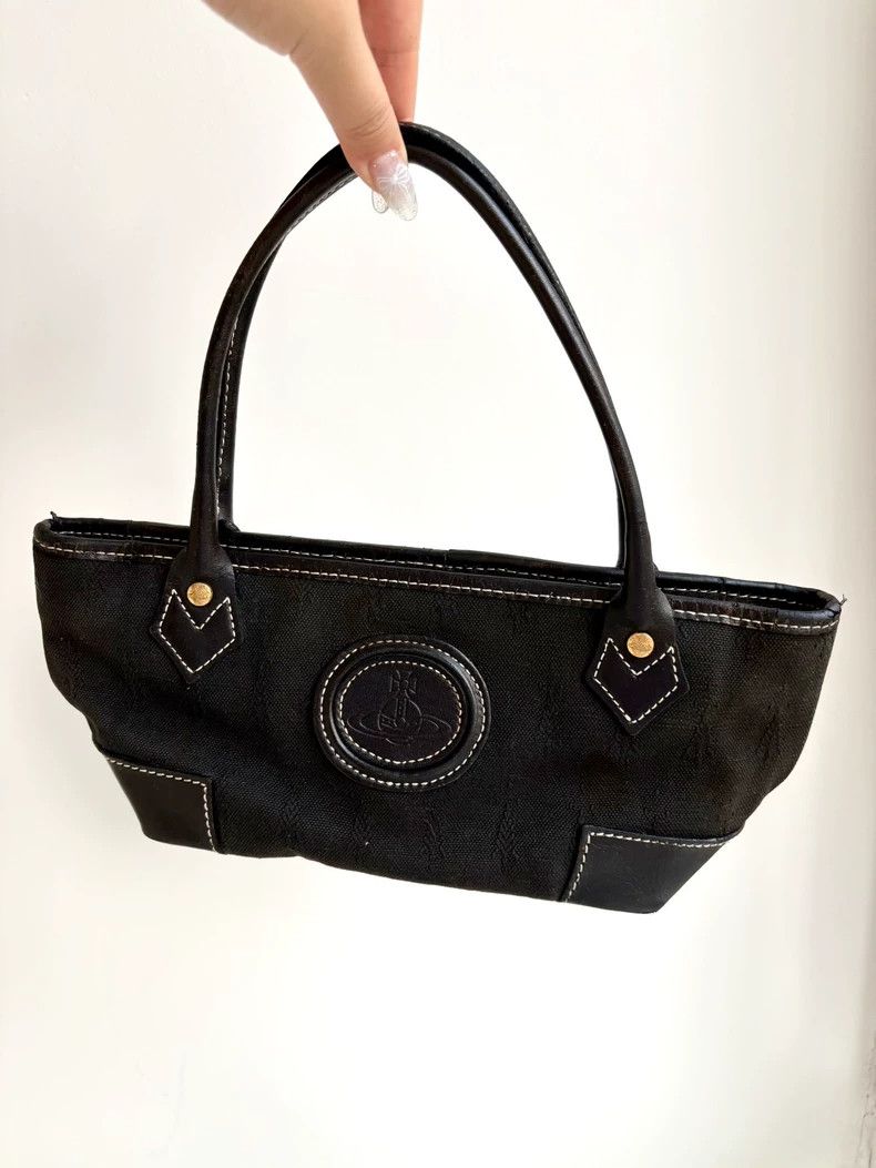 Vivienne Westwood Vivienne Westwood size os Black canvas Saturn Logo handbag Size ONE SIZE - 1 Thumbnail