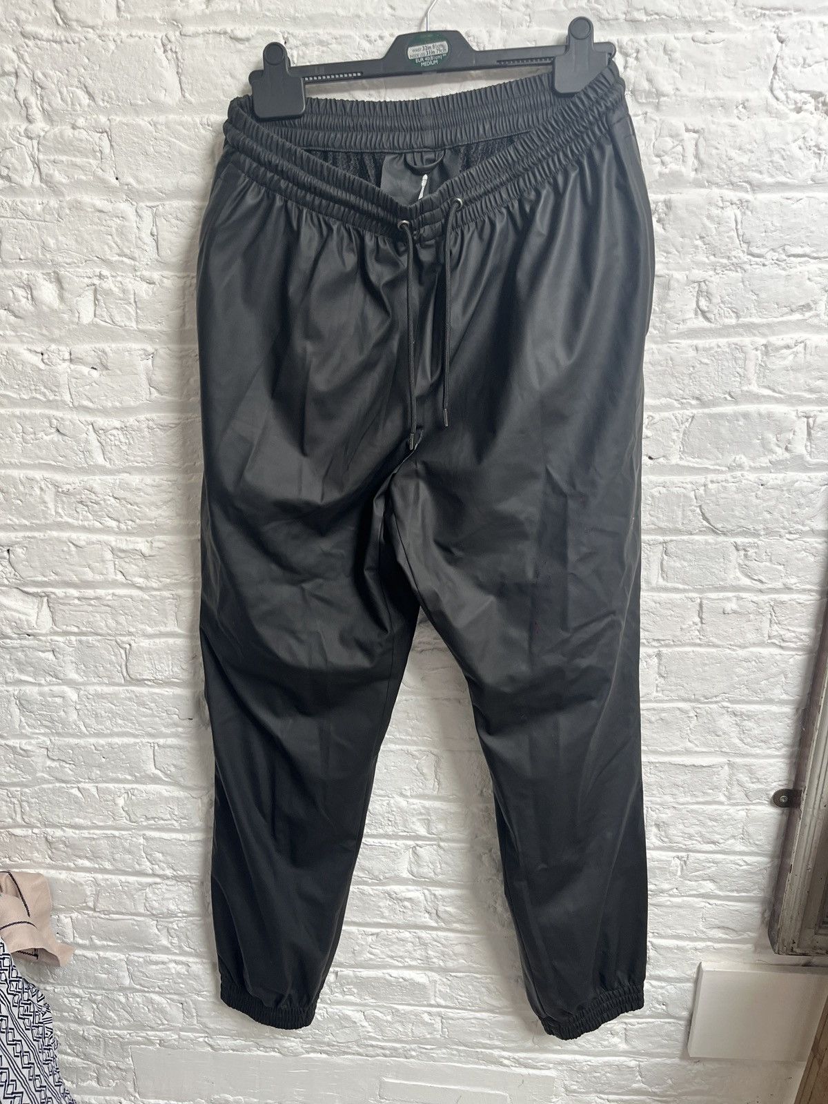Rains coated black Rains pants Size US 34 / EU 50 - 1 Thumbnail