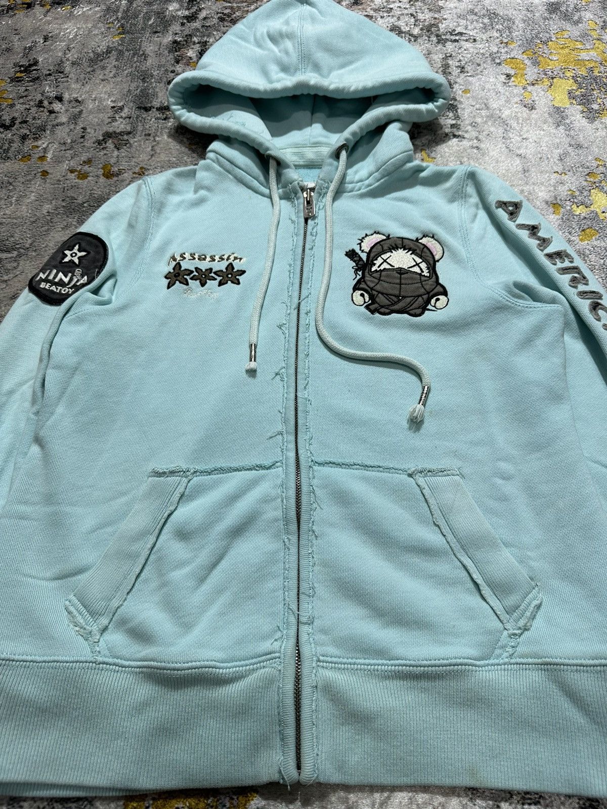 20471120 × Beauty Beast × Japanese Brand DISTRESSED EMBROIDERY AMERICAN NINJA ASSASIN ZIP HOODIE Size US M / EU 48-50 / 2 - 5 Thumbnail