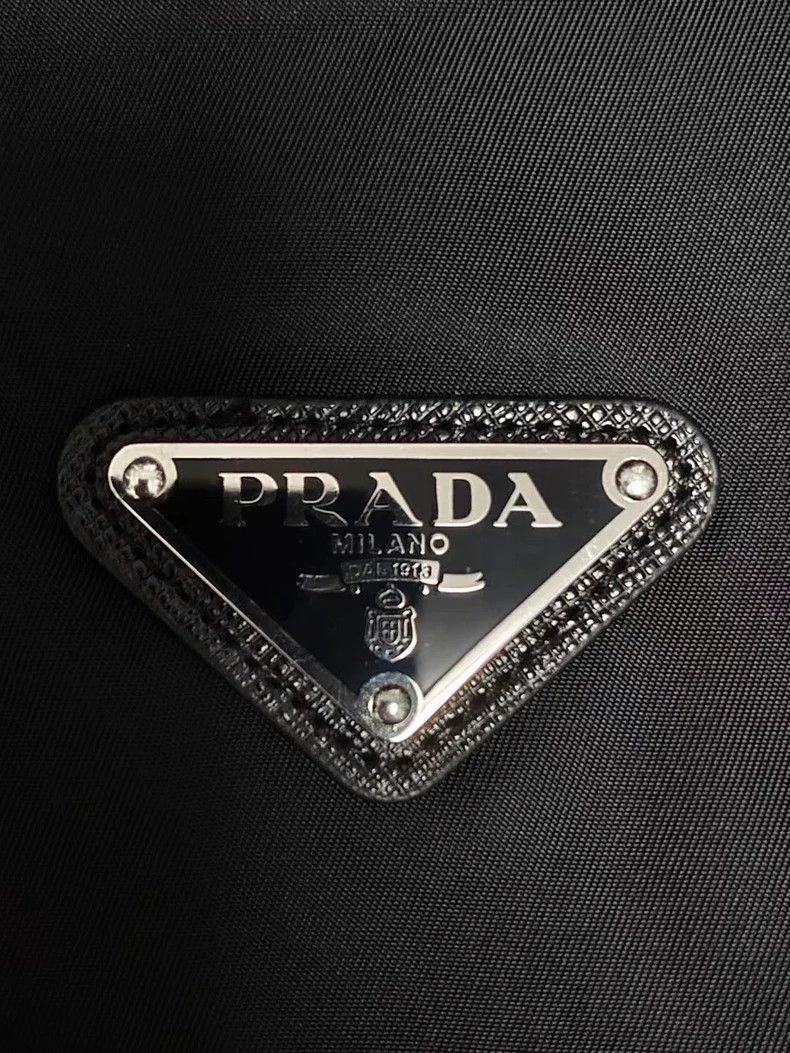 Prada Prada 22fw metal triangle logo nylon long-sleeved jacket 25 Size US XL / EU 56 / 4 - 3 Thumbnail
