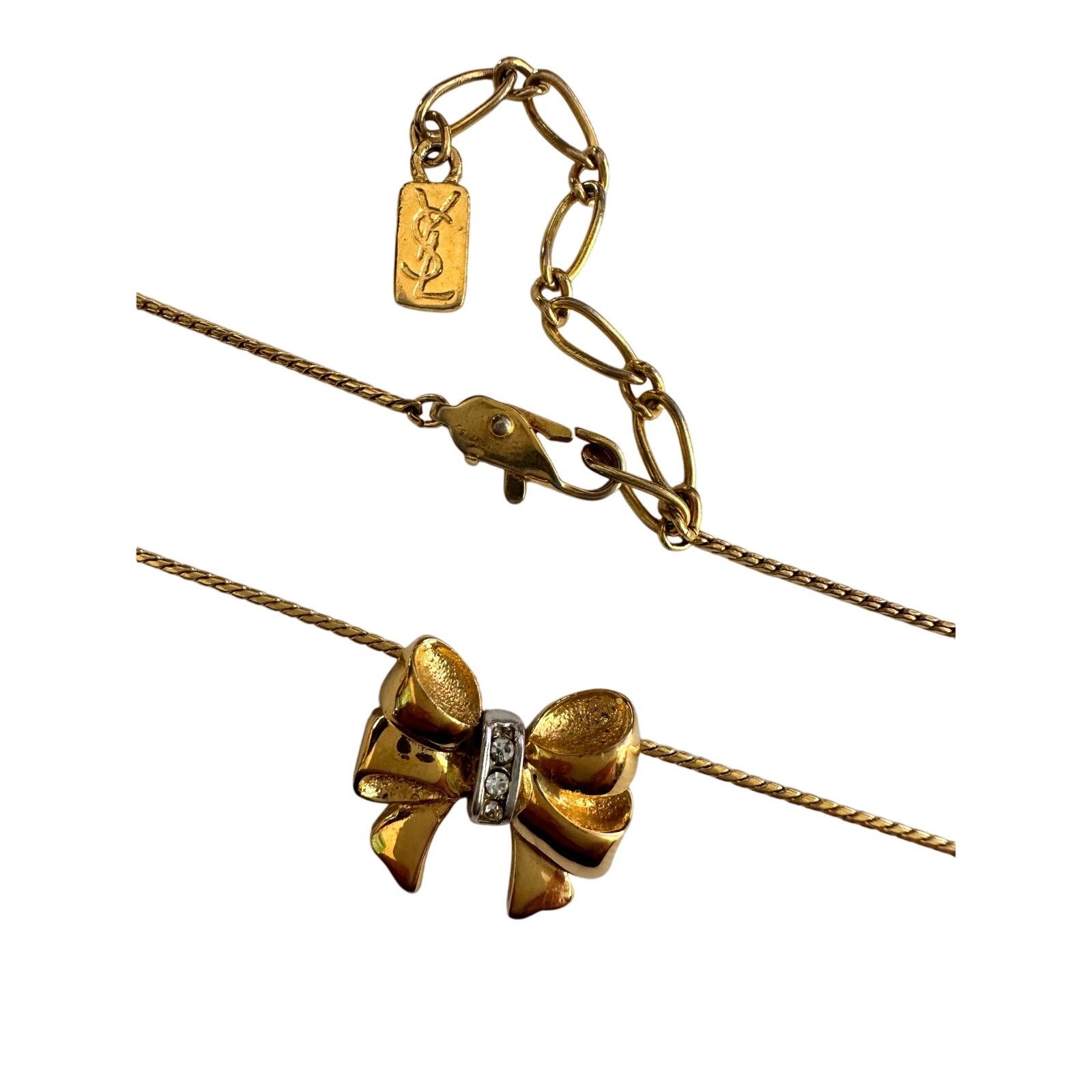Yves Saint Laurent Yves Saint Laurent Gold and Rhinestone Bow Necklace Size ONE SIZE - 9 Thumbnail