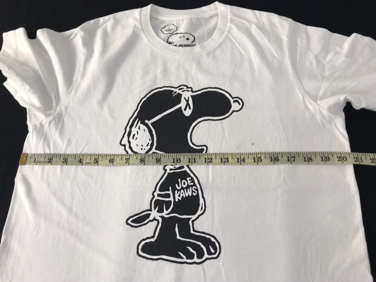 Kaws × Peanuts Kaws X Peanuts Skating Snoopy Big Printed Tee Size US M / EU 48-50 / 2 - 10 Thumbnail