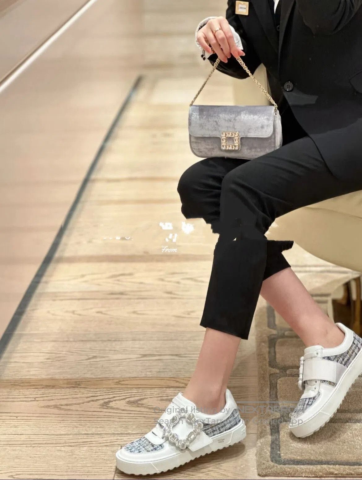 Roger Vivier RV Crystal Buckle Sneakers.