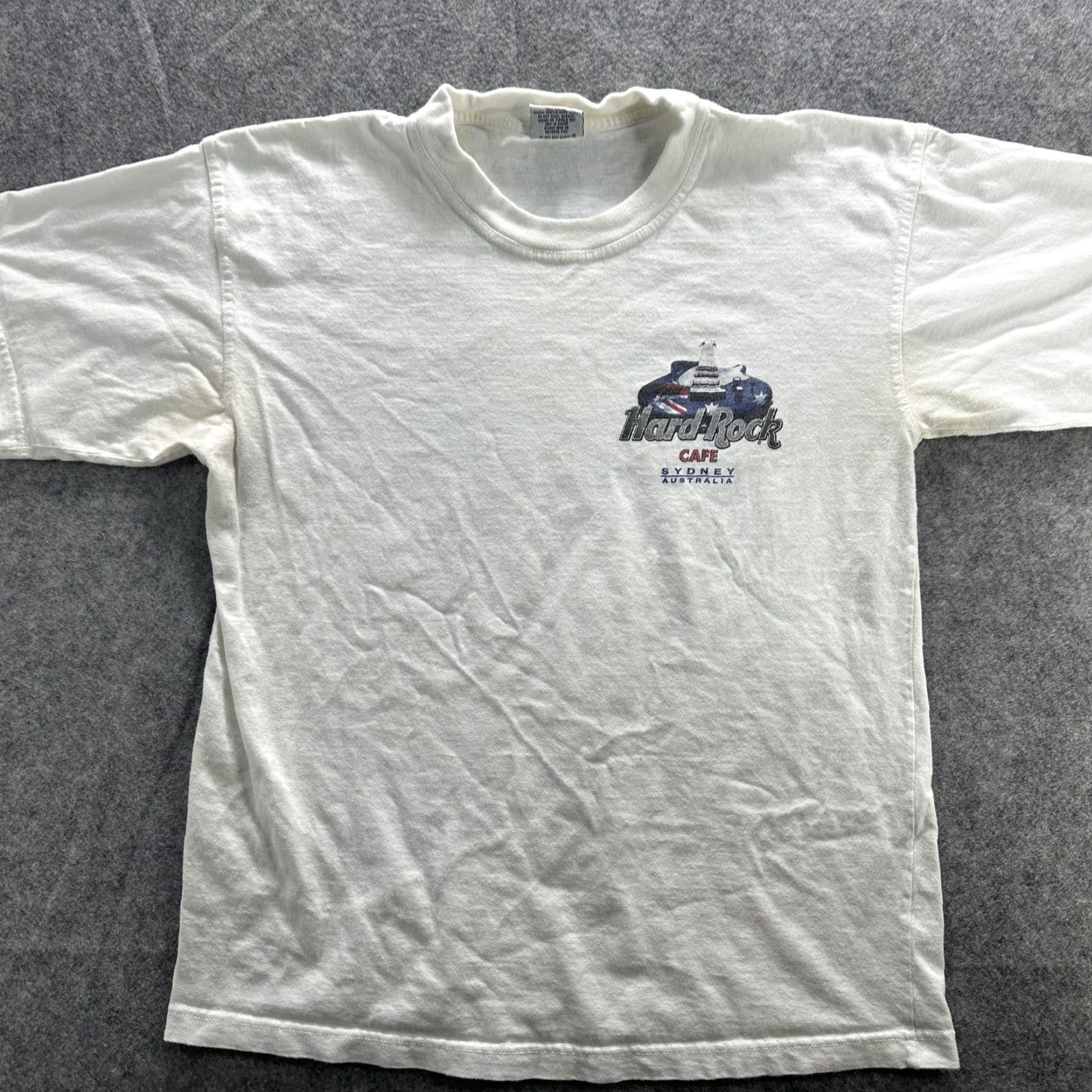 Hard Rock Cafe VINTAGE Hard Rock Cafe Shirt Mens Small White Sydney Australia 90s Guitar Rock Music Graphic Print Crew Neck Short Sleeve Cotton T-Shirt Size US S / EU 44-46 / 1 - 3 Thumbnail