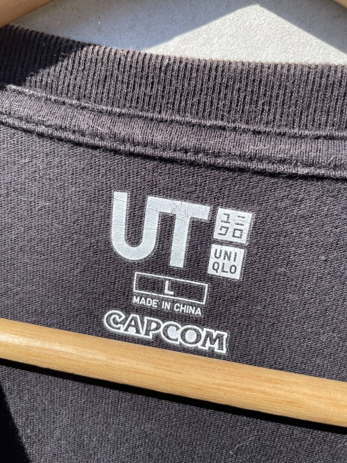 Uniqlo RARE🔥 Capcom Dragon Monster Hunter Size US L / EU 52-54 / 3 - 5 Thumbnail