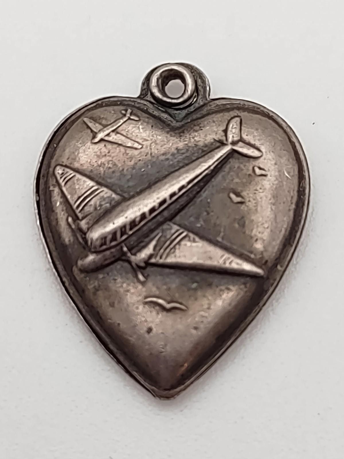 The Unbranded Brand WWII Sterling Silver P-38 Lightning Airplane Heart Pendant Size ONE SIZE - 1 Thumbnail