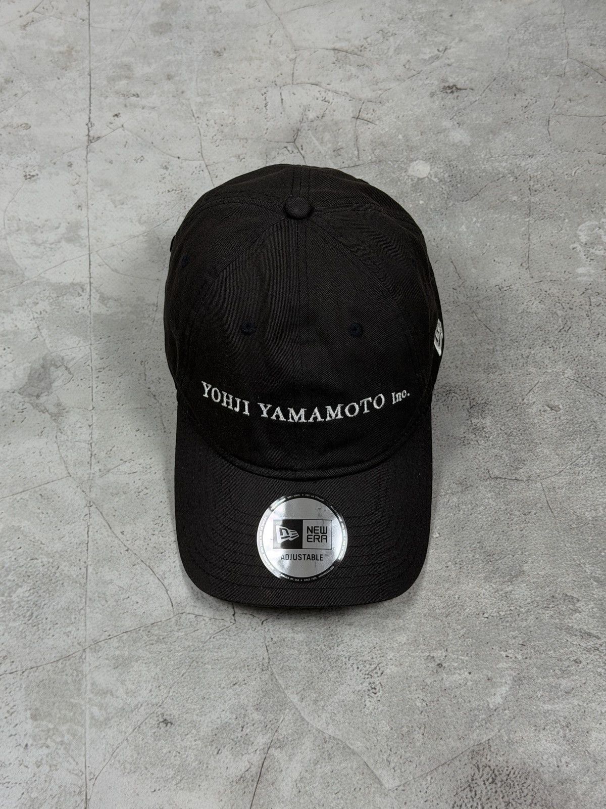 Yohji Yamamoto Yohji Yamamoto x New Era side logo collaboration