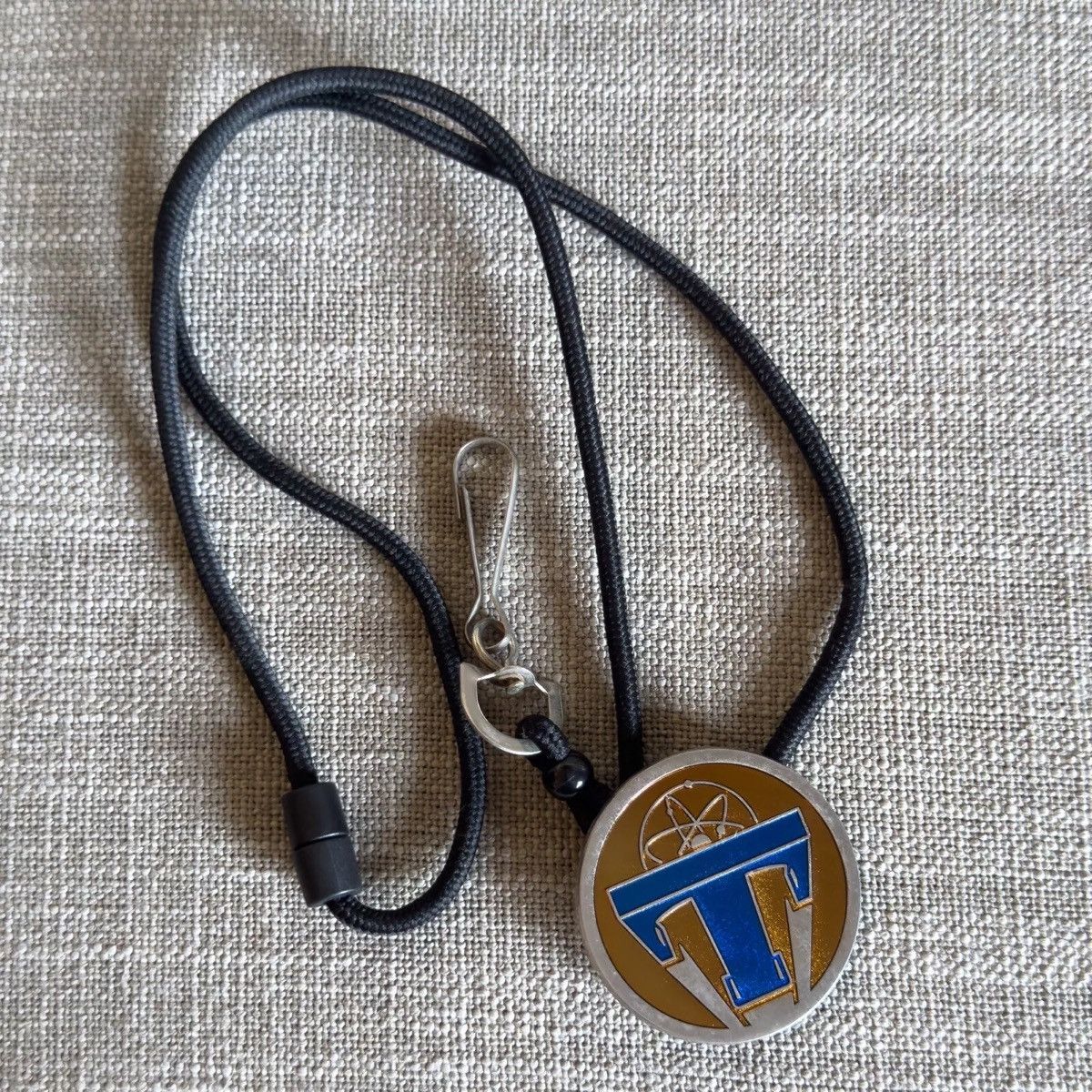 Disney Cast Member Exclusive Bolo Tomorrowland Logo Pin Lanyard Size ONE SIZE - 1 Thumbnail