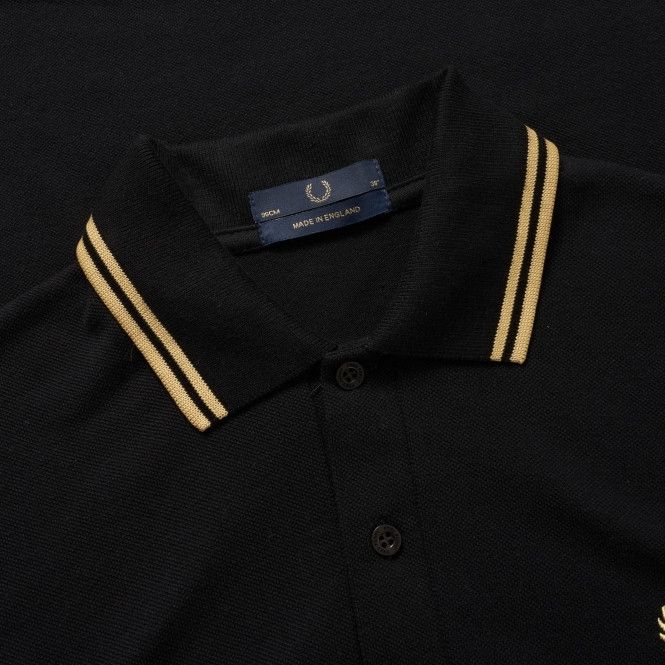 Fred perry polo store black and gold