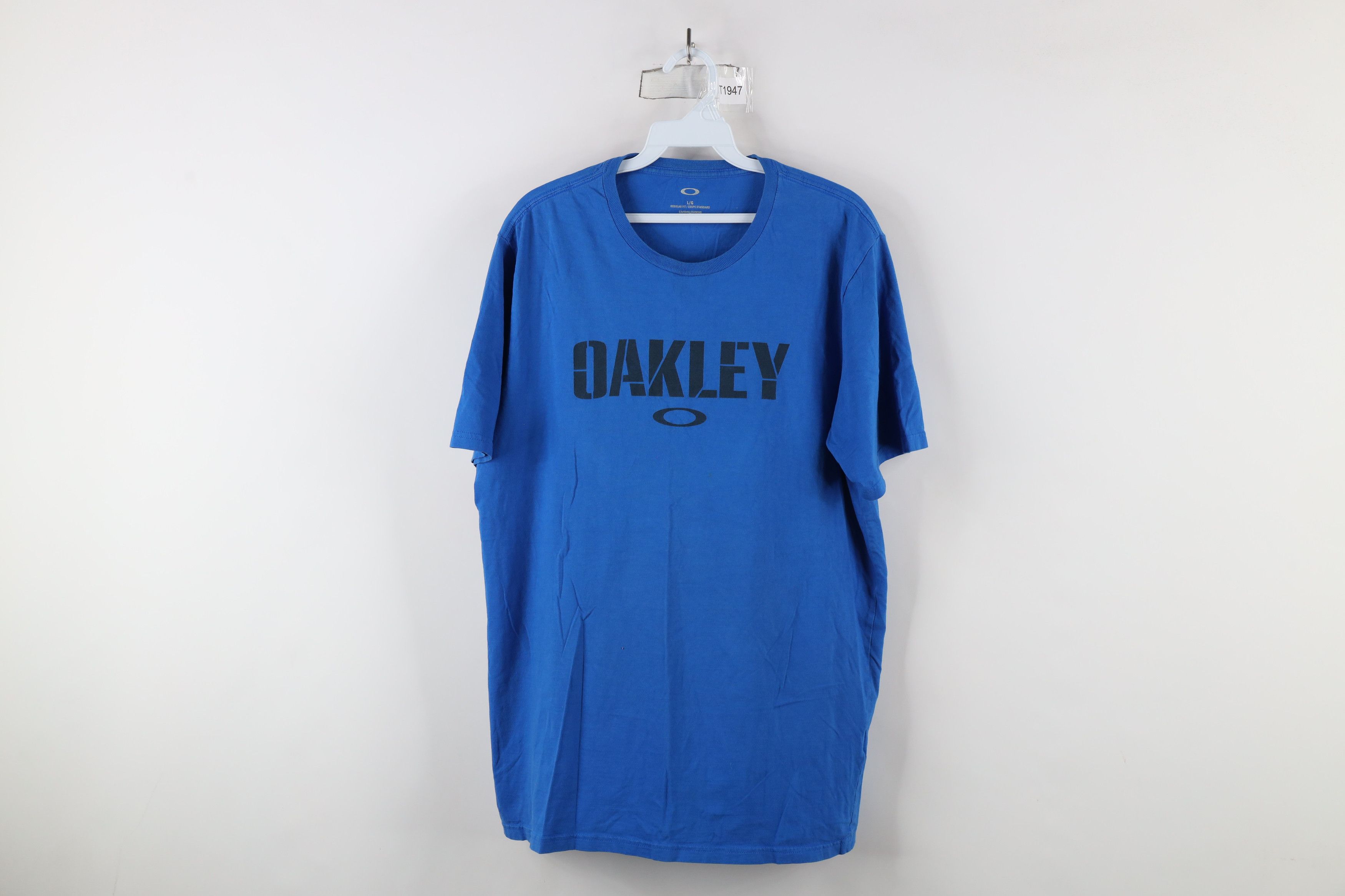 Oakley × Vintage Vintage Oakley Spell Out Stencil O Logo Short Sleeve T-Shirt Size US L / EU 52-54 / 3 - 1 Thumbnail