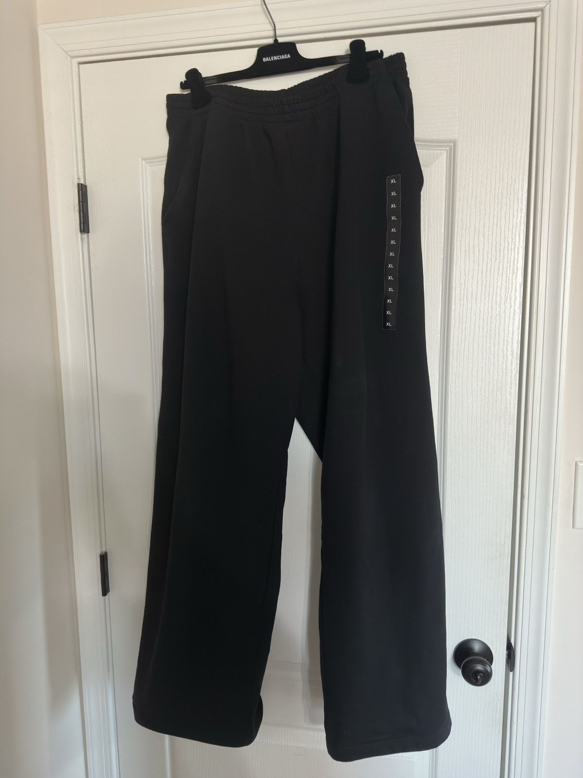 image of Balenciaga Sticker Baggy Sweatpants in Black, Men's (Size 34)