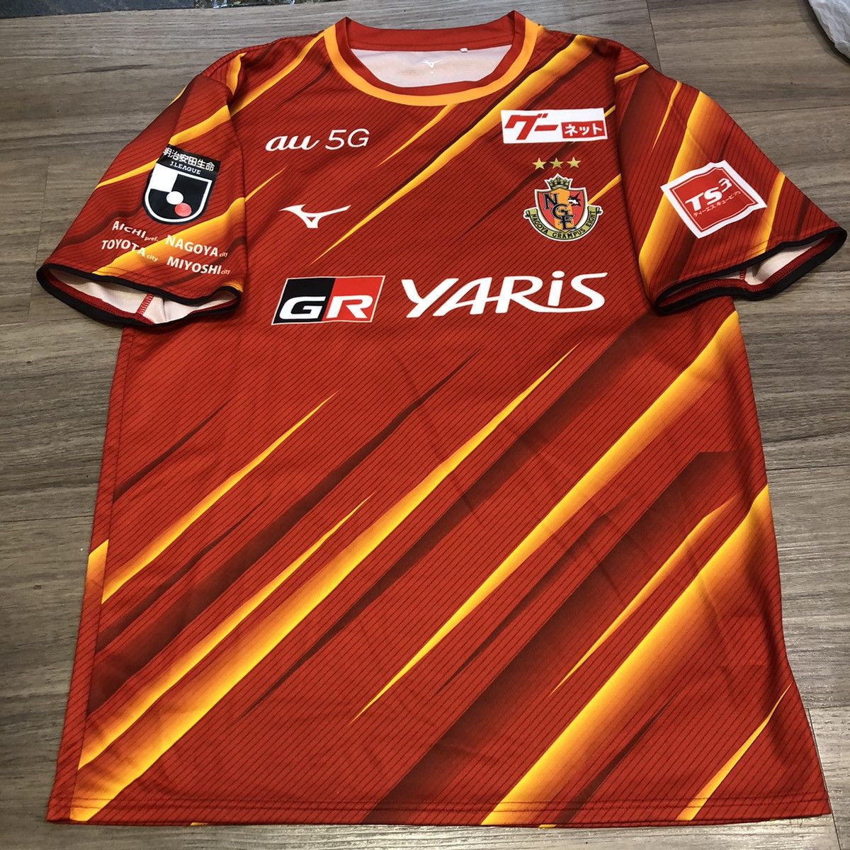 image of Mizuno x Soccer Jersey Nagoya Grampus Eight 2021 Home Shirt 8 Yoichiro in Red/Orange (Size Medium)