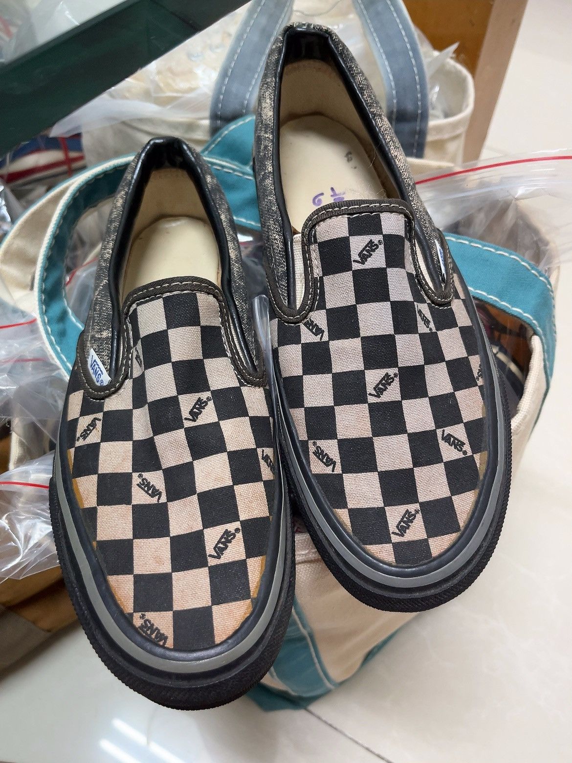 Vans Vintage 80s Vintage Vans logo check shoes slip on made in USA Grailed