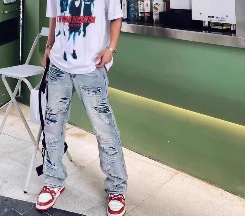 grunge damaged ripped washed flared jeans