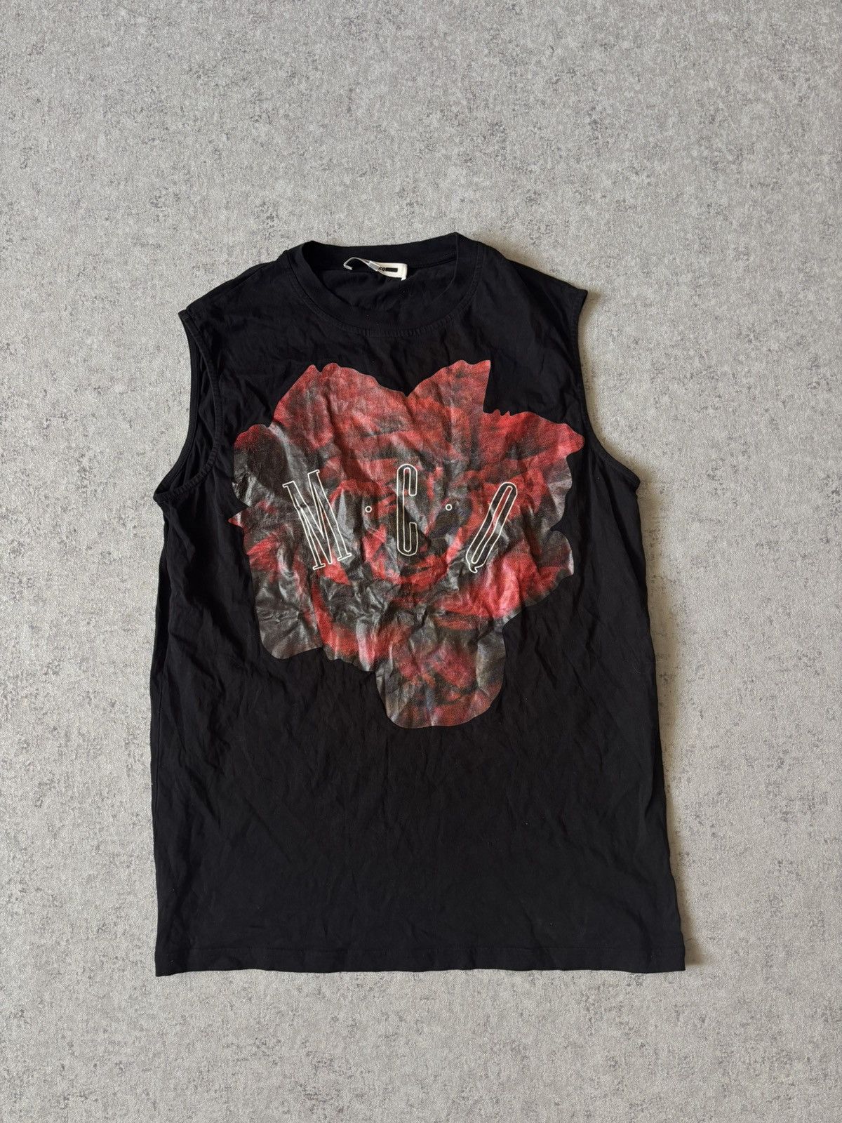 Tシャツ・カットソー ALEXANDER MCQUEEN SLASHED KNIT SLEEVELESS TOP Alexander McQueen SS1997 Tire Print Tank Top | Grailed