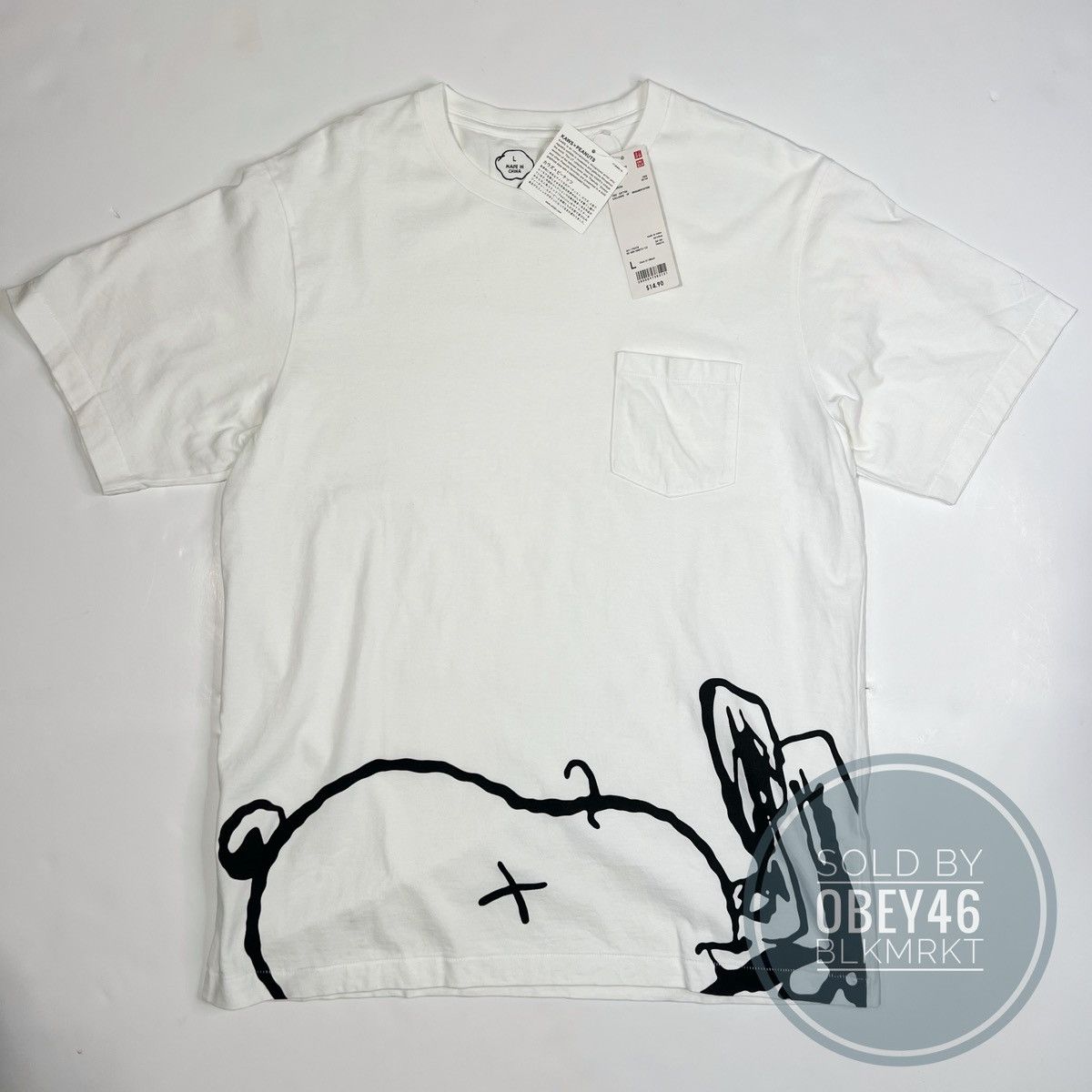 Kaws × Peanuts × Uniqlo KAWS X Uniqlo X Peanuts Snoopy Face Pocket Tee Size US L / EU 52-54 / 3 - 1 Thumbnail