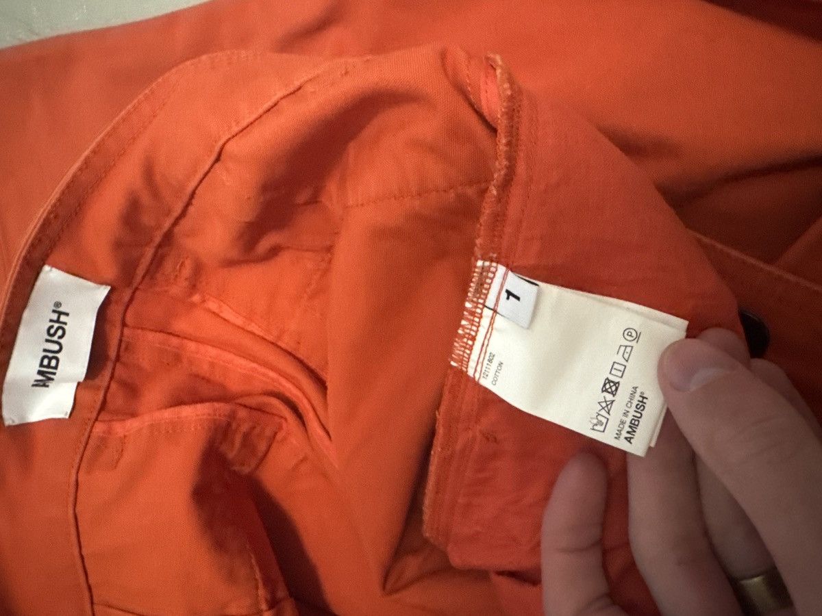 Ambush Design Ambush orange tapered cotton-canvas trousers Size US 31 - 9 Thumbnail