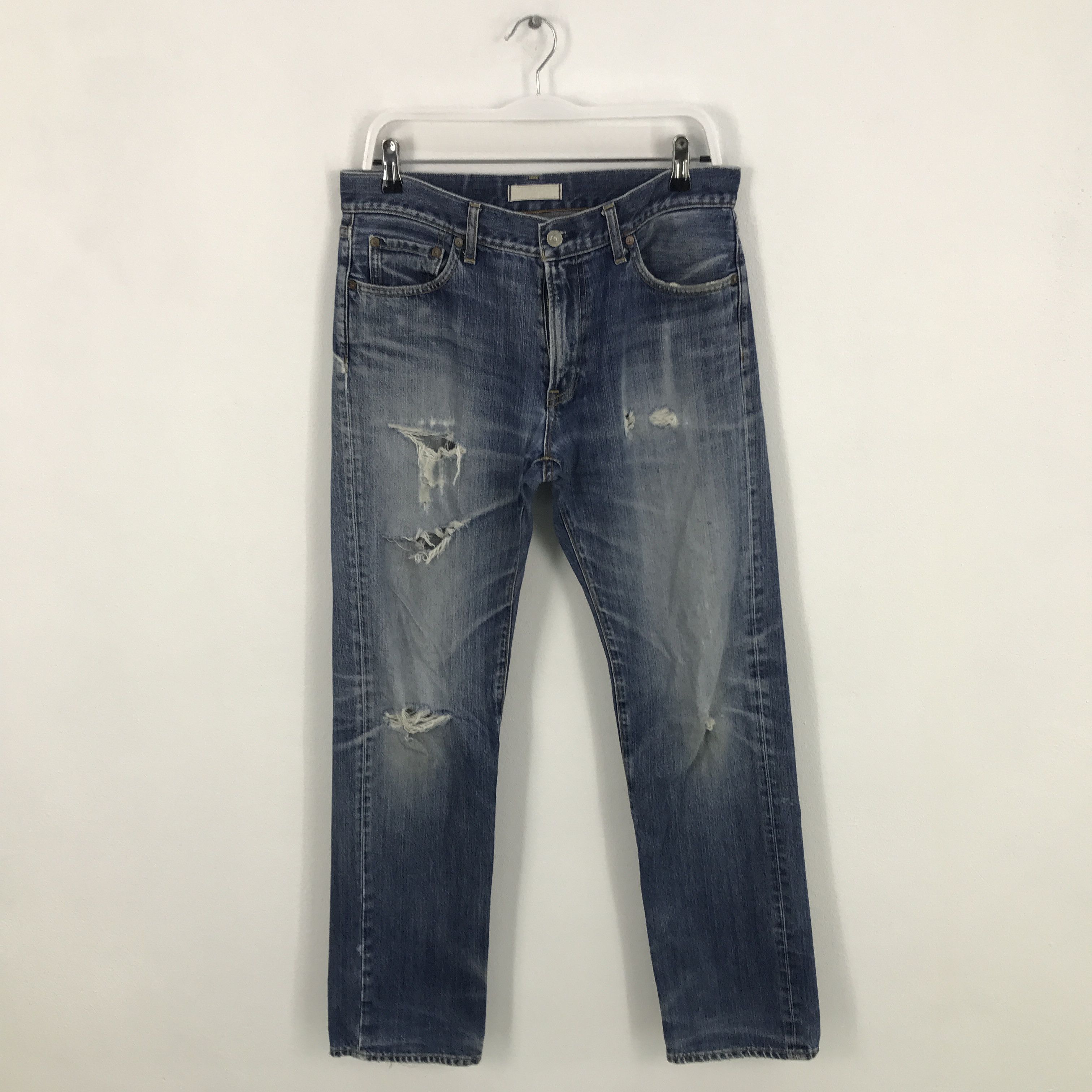 Japanese Brand × Uniqlo Rare uniqlo japan design distressed jeans pants Size US 31 - 1 Thumbnail