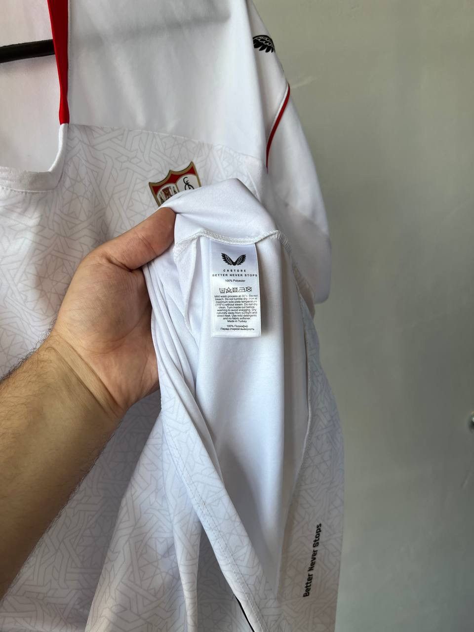 Castore 2022/23 SEVILLA FC HOME SOCCER JERSEY FOOTBALL SHIRT CASTORE Size US L / EU 52-54 / 3 - 10 Thumbnail