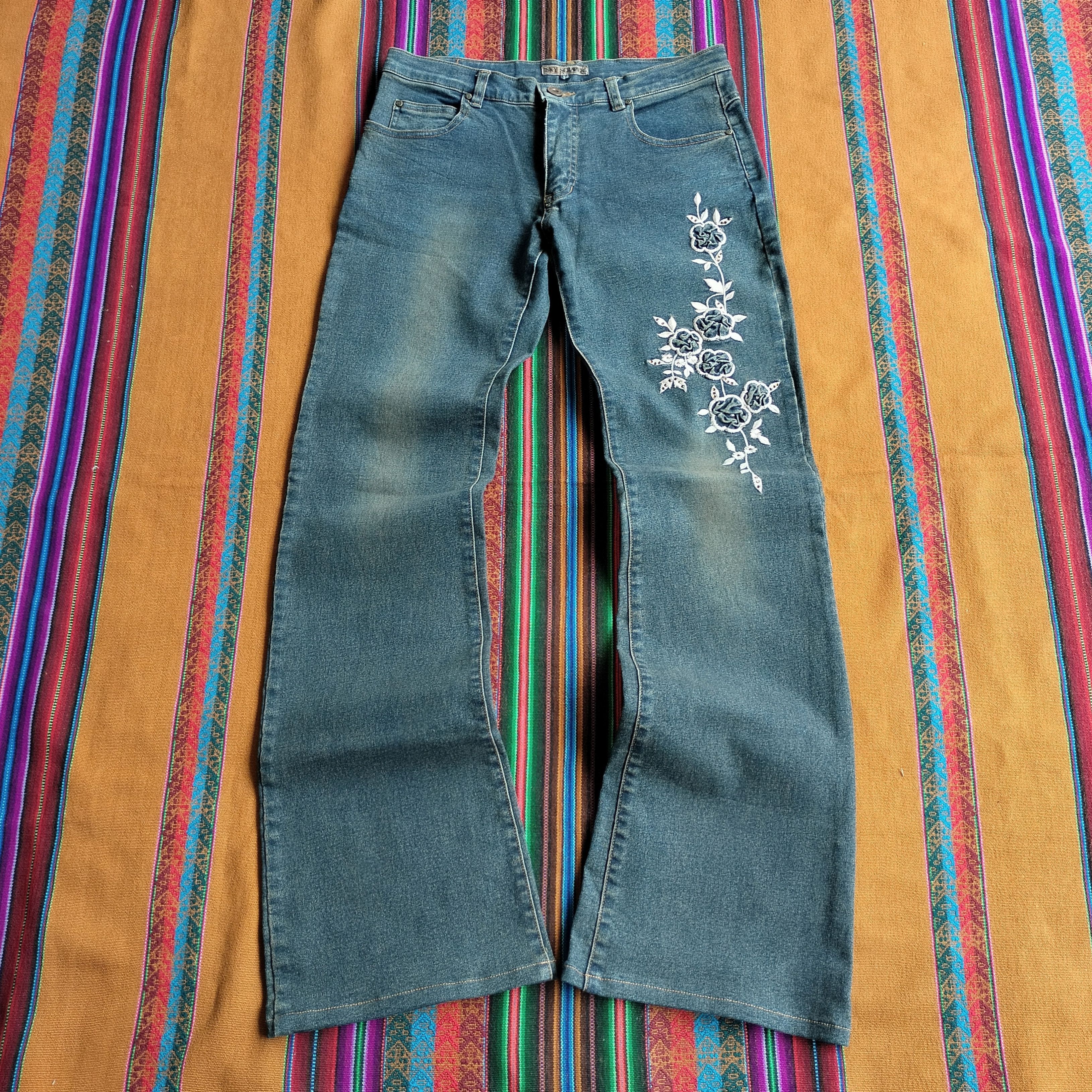Tornado Mart Tornado Mart 3D Python Pattern Flared Jeans | Grailed
