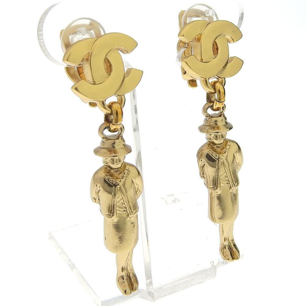 image of Chanel Cc Mademoiselle Doll Dangle Earrings in Gold, Women's