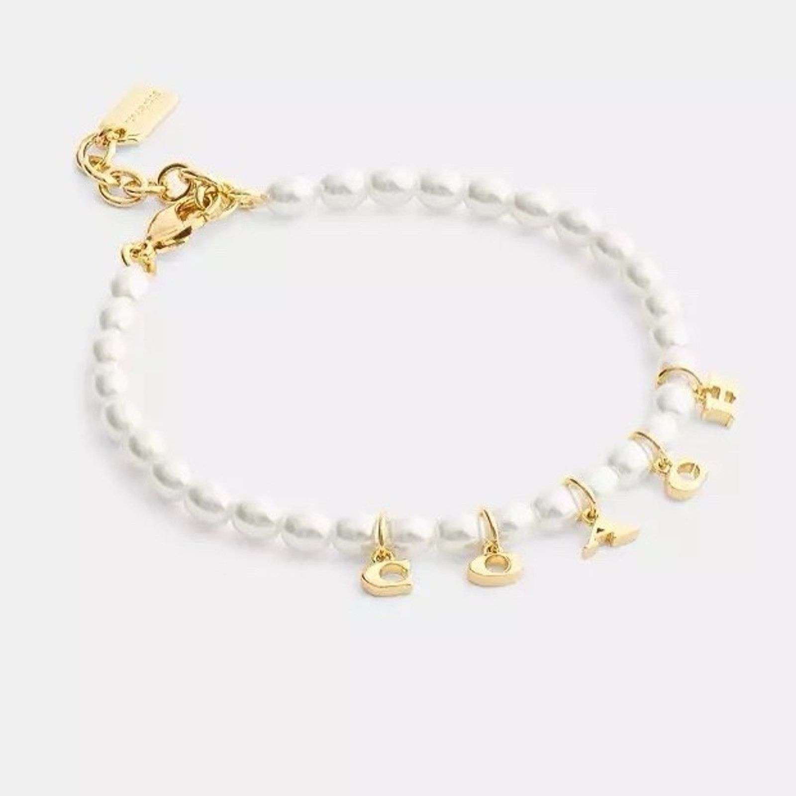 Coach NWT Coach Charms Pearl Bracelet CCU62 White and Gold Color Size ONE SIZE - 4 Thumbnail