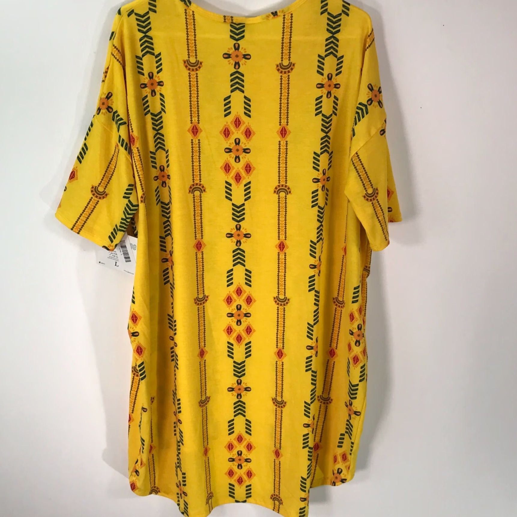 Vintage **LuLaRoe Women Yellow Geometric Asymmetrical Tunic Blouse Size L** User: LuLaRoe Women Yellow Geometric Asymmetrical Tunic Blouse Size L Size L / US 10 / IT 46 - 2 Thumbnail